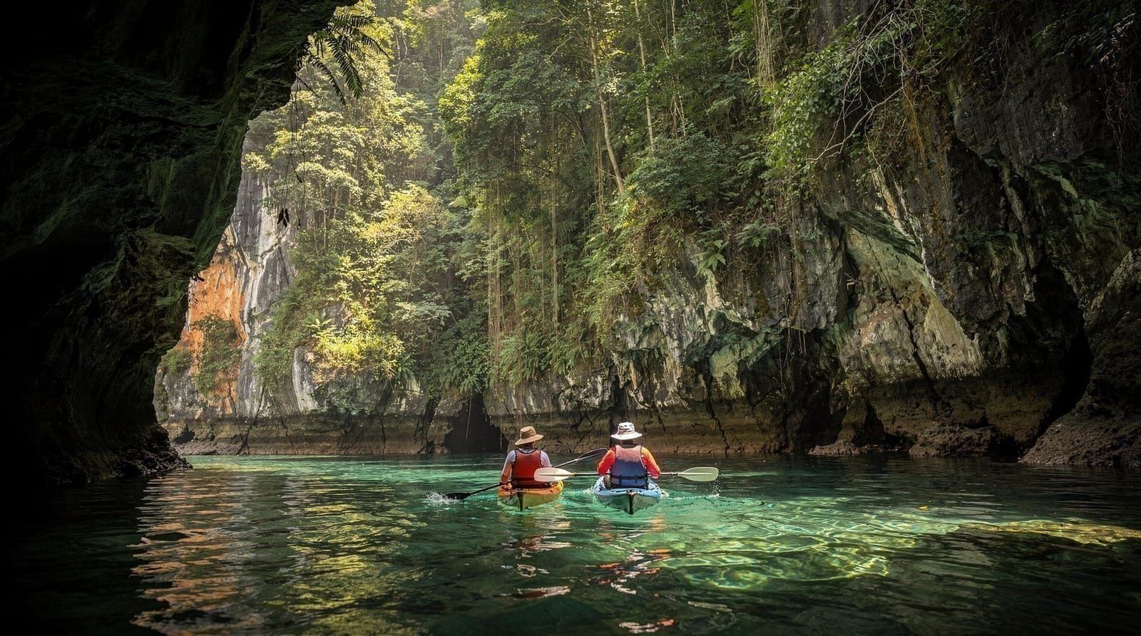 Phang Nga Bay sea kayaking — full-day tour through limestone hongs — Paddle inside hidden limestone cathedrals, visit a stilted fishing village, and 